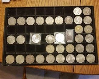 Tray of Silver Dollars including Morgan Dollars and Peace Dollars dates 1878-1935; Eisenhower Dollars 1971-1978; one TO .999 Silver Bar; 35 items total CHOICE