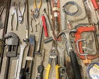 1 OF MANY TABLES FULL OF TOOLS