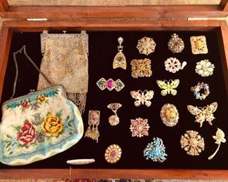 Beaded bags and jeweled brooches 
