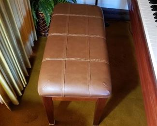 Howard baby grand piano and stool by Howard