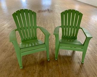 HALF OFF !  $5.00 NOW, WAS $10.00.............Pair of Heavy Plastic Adinorandack Chairs one has small rip as is  (M015)