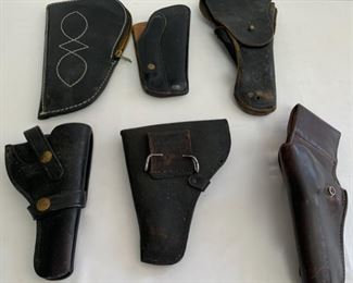 REDUCED!  $45.00 NOW, WAS $60.00..........5 Leather Holsters and gun bag (C027)