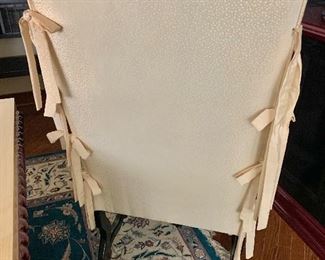 Detail: Back of chair with bow detail