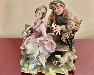 $75 - Capodimonte Figural; 10.5” H x 10.5” W