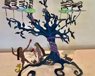 $60 - Metal art menorah (front); approx 17” H x 18”W