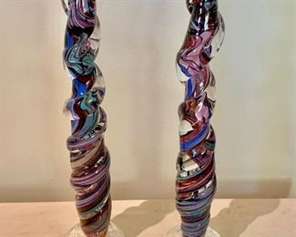 $250 - pair signed, art glass candle holders; 16” H
