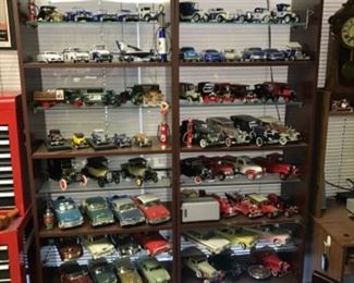 Huge car collection with modern cars as well as replicas of antique cars.  