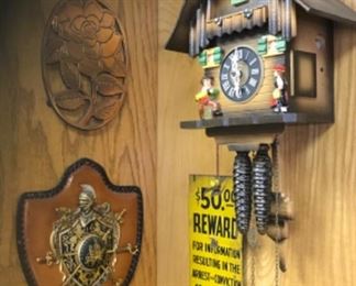 Old sign, cuckoo clock, coat of arms 