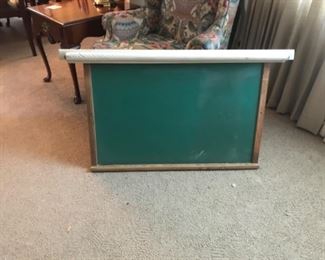 Vintage school chalk board, with pull down projection screen.
