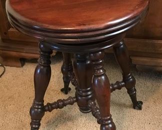 4 leg, glass foot piano stool.