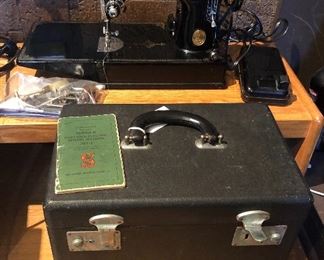 Singer Featherweight sewing machine - Model 221-1, manufactured June 1948 - with case, manual & attachments.