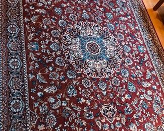 Synthetic Oriental design rug (65” x 95”)