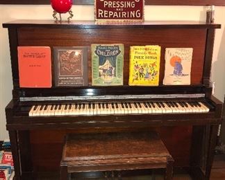 1915 Andrew Kohler upright mahogany piano (51” H, 57”L, 25.5”D) + bench. Cool antique advertising mirror on top! Also music books & sheets music
