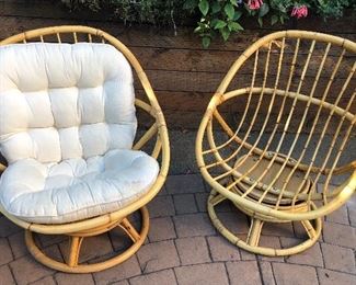 Rattan swivel chairs - each 28”W, 33”H at back. With cushions (only one shown)