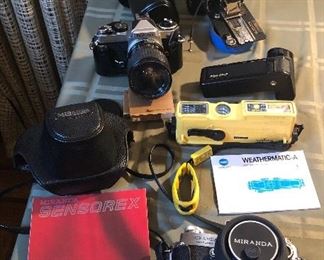 Cameras: Nikon FE 35mm, antique Conley Junior, Nikon MD-12 motor drive, Minolta Weathermatic-A, Miranda Sensorex w/ case, manual & original paperwork