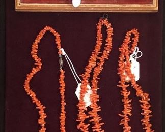 Assorted rings (some sterling), coral necklaces
