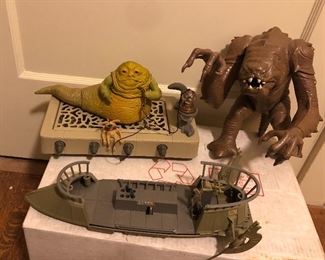 Vintage “Return of the Jedi” toys: Jabba is SOLD, Kenner Rancor monster, Tatooine skiff (see next photo for more of skiff) We also have Star Wars/ROTJ ephemera (word puzzle books, sticker sets, etc.), blanket, twin sheet set & more.