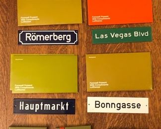 Airline swag - Lufthansa “Farewell Present” enamel signs in original sleeves (we have 10+ total), also “Senator Present” wax seal kits