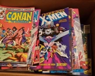 Bunches of X-Men and Conan comic books