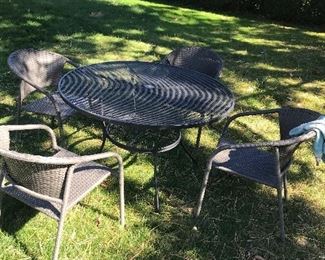 Synthetic wicker chairs and matching table