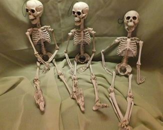 Three Hanging Skeletons