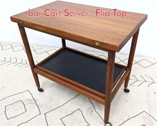 Lot 1062 Danish Modern Teak Rolling bar Cart Server. Flip Top. 