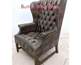 Lot 1144 Chesterfield Style Tufted Button Wing Chair. 