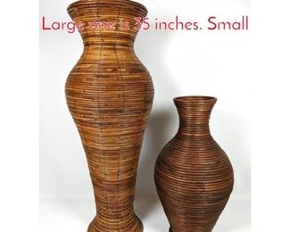 Lot 1467 2pc Wrapped Rattan Vases. Large one is 35 inches. Small