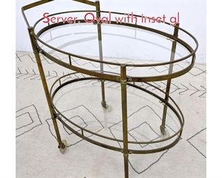 Lot 1180 Italian Style Brass Bar Cart Server. Oval with inset gl