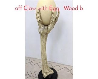 Lot 1181 Contemporary Resin Sculpture off Claw with Egg. Wood b
