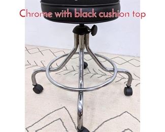 Lot 1319 Rolling Draftsman Stool. Chrome with black cushion top