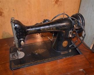 antique Singer Sewing machine with cabinet