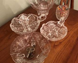 SOME OF THE CUT GLASS PIECES