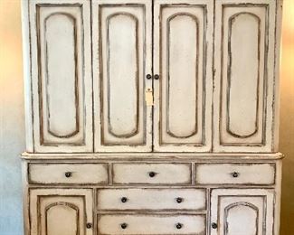 $2000-Distressed media armoire perfect for the modern farmhouse! Colors favor ivory, grey with natural wood tones. YOU MOVE! Heavy, but two pieces. Measures 73”l x 20”w x 83” h. More images of this item available. Keep scrolling through!