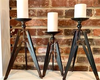 $60-STAFF FAVORITE! Set of THREE tripod pillar candle holders. 