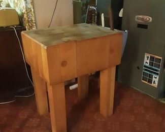 Authentic vintage all wood butcher block table with side knife holder.