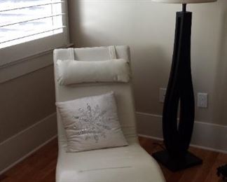 Black & white theme with leather chaise and black floor lamp