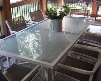 Great looking modern outdoor dining table with 8 chairs