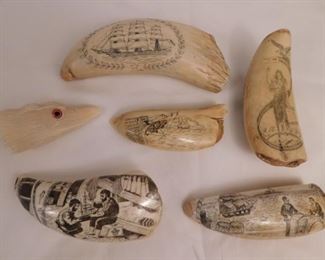 About 20 antique whale teeth