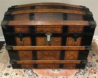 Price: $350. Antique trunk (Pritchard?) stagecoach camelback with great detailing. Measures: 26.5"H x 34"W x 21.5"D