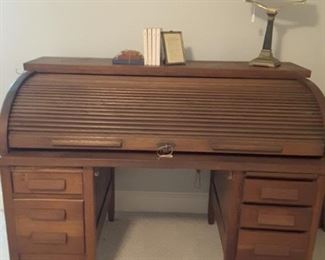 Beautiful antique, solid oak, roll top desk. Originated from the Albany Peanut Company on Roosevelt Street. Circa 1920s - 30s