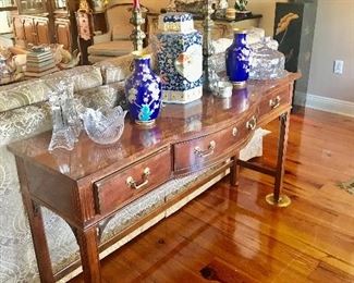 Console By Sherrill Occasional: bowed mahogany three drawer console table with birds-eye maple crossbanded top and drawers fronts 