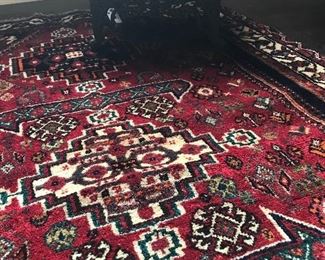 Gorgeous Persian rug and antique cast iron step stool