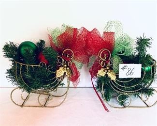 Pair of Christmas sleighs  10 inches long $25