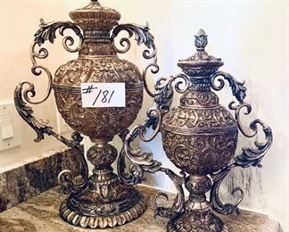 Pair of decorative French style urns 
21” tall  and 17 inches tall
$125