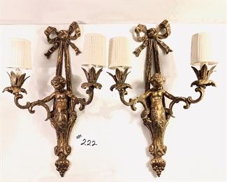 Pair of brass cherub sconces Vintage
13 inches wide by 22 inches tall $175 (Shades are slightly stained)