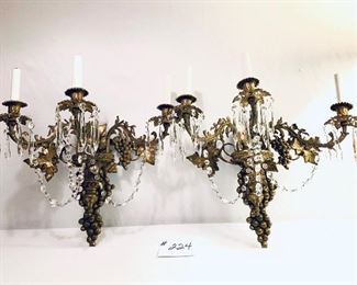 Pair of vintage ornate brass sconces with crystals 18 inches tall by 18 inches wide $250
 (a couple of prisms are missing)
