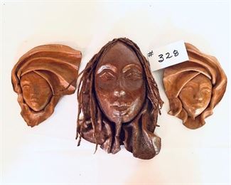 Set of three leather masks 8 to 11 inches tall set $49