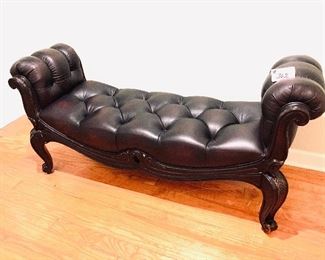 # 362- Tufted leather like material bench (small damage to leg see next  photo )64 inches long. Seat height 17.5 inches tall $195