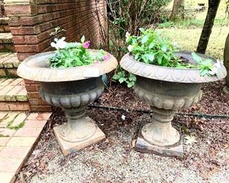 #368- Large cast-iron planters 26 inches wide by 26.5 inches tall 
$285 pair. 